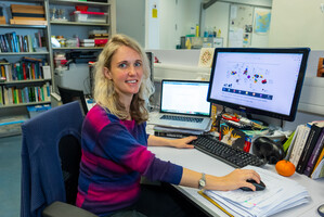 Astrid Andersson at her desk - she has just defended her PhD thesis on the trade in  cockatoos  (Photo Credit: Alex Reshikov)